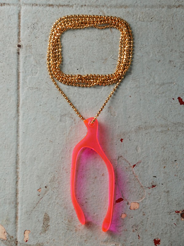 Fluorescent Pink Neon Wishbone Necklace on a Gold Chain